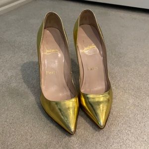 Christian Louboutin gold patent pumps